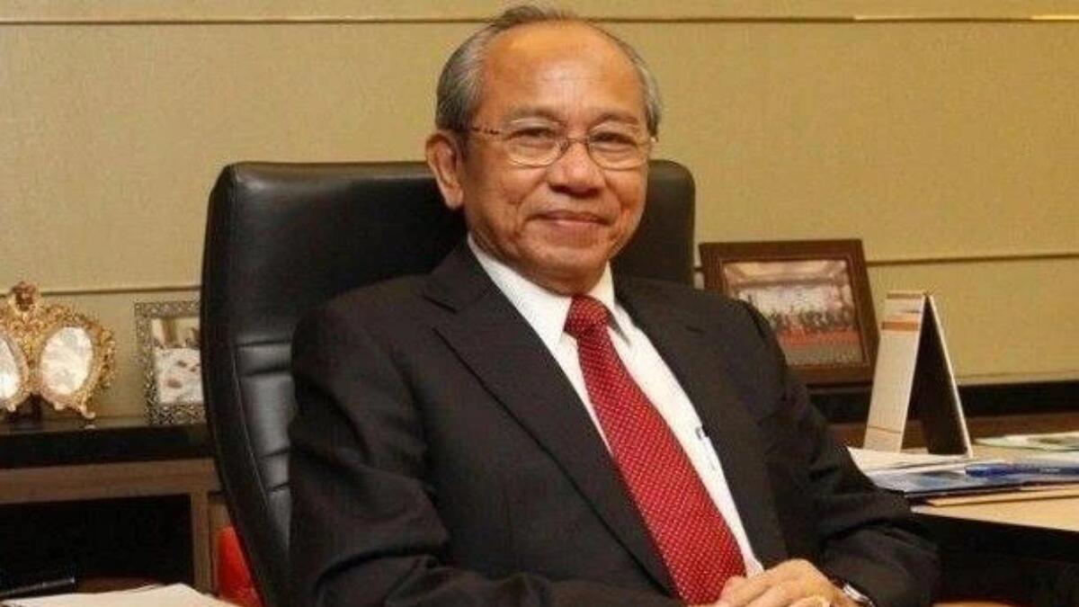 Portrait of Wichai Thongtang, Thai billionaire lawyer and investor, wearing a business suit.