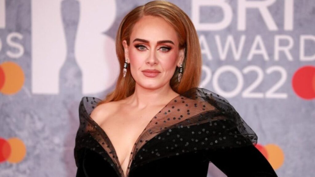 Adele mid-performance at her Vegas residency, known for her powerful million-dollar voice and record-breaking earnings.