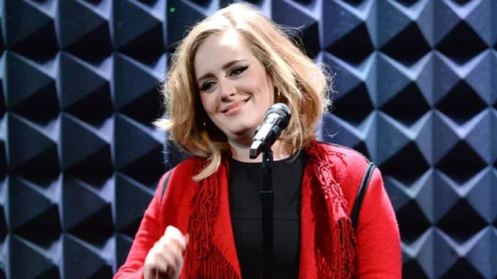Adele on stage during her Las Vegas residency, symbolizing her legacy phase with understated glamour and powerful vocals in 2025.