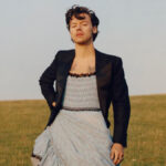 Harry Styles modeling in Gucci’s Ha Ha Ha collection, showcasing his role as a key figure in Gucci’s fashion campaigns.