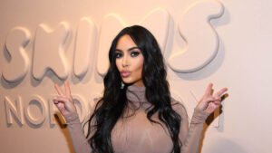 Kim Kardashian wearing SKIMS shapewear in a promotional campaign shoot