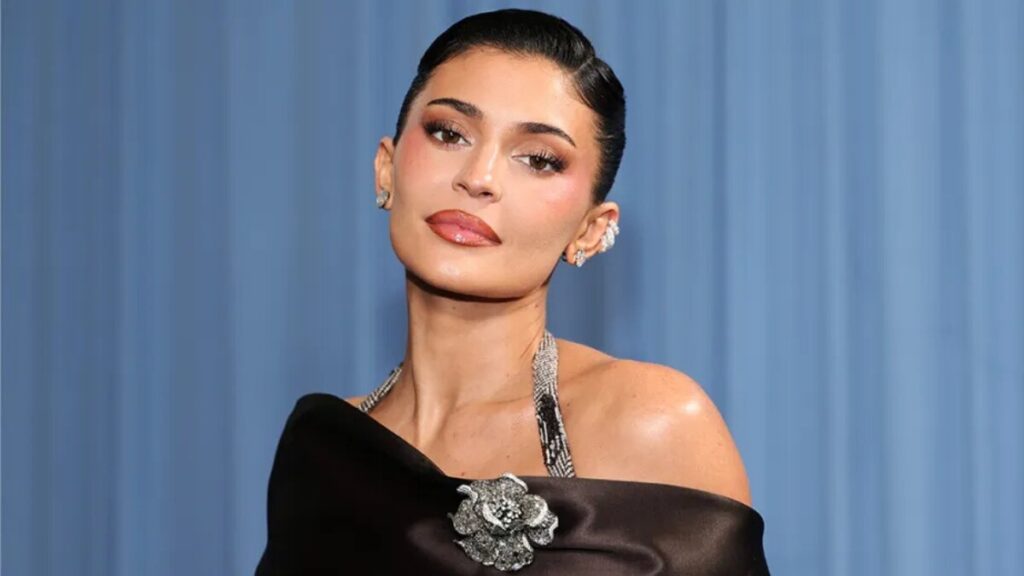 Kylie Jenner posing for a promotional photo shoot, representing her personal brand
