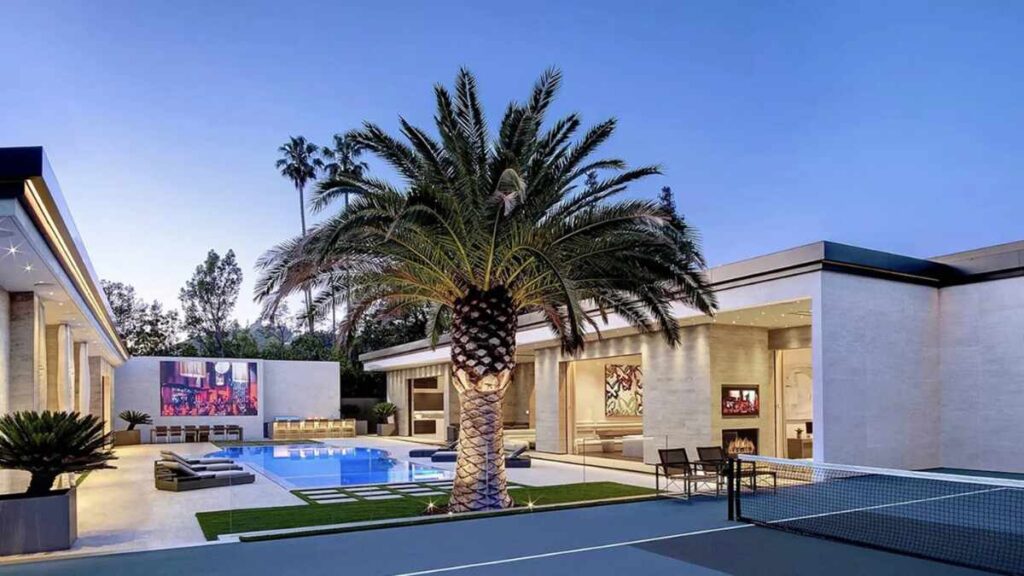 Kylie Jenner’s stunning Holmby Hills mansion featuring sleek modern design, expansive outdoor areas, and luxurious amenities, reflecting her sophisticated real estate style.