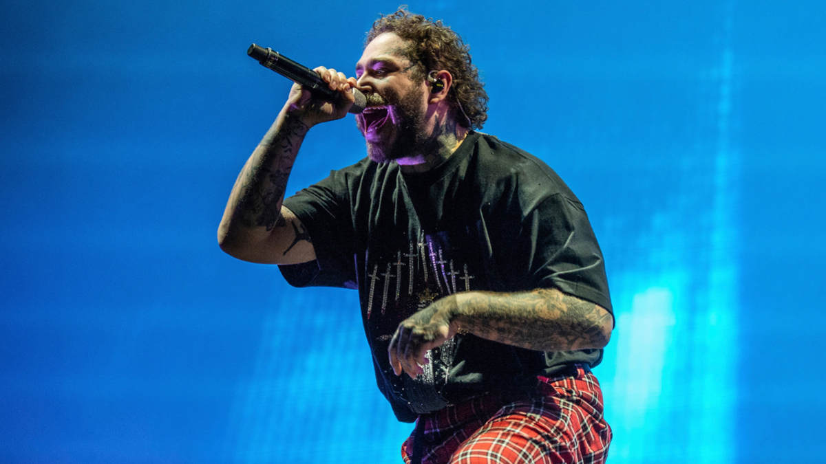 Post Malone performing on stage during the Hollywood’s Bleeding tour, 2019–2020