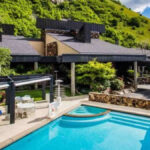 Post Malone’s Utah mansion nestled in the mountains, showcasing his unique real estate style and secluded lifestyle.