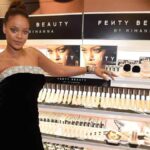 Rihanna at a Fenty Beauty event representing the brand’s multibillion-dollar valuation