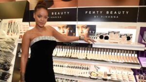 Rihanna at a Fenty Beauty event representing the brand’s multibillion-dollar valuation