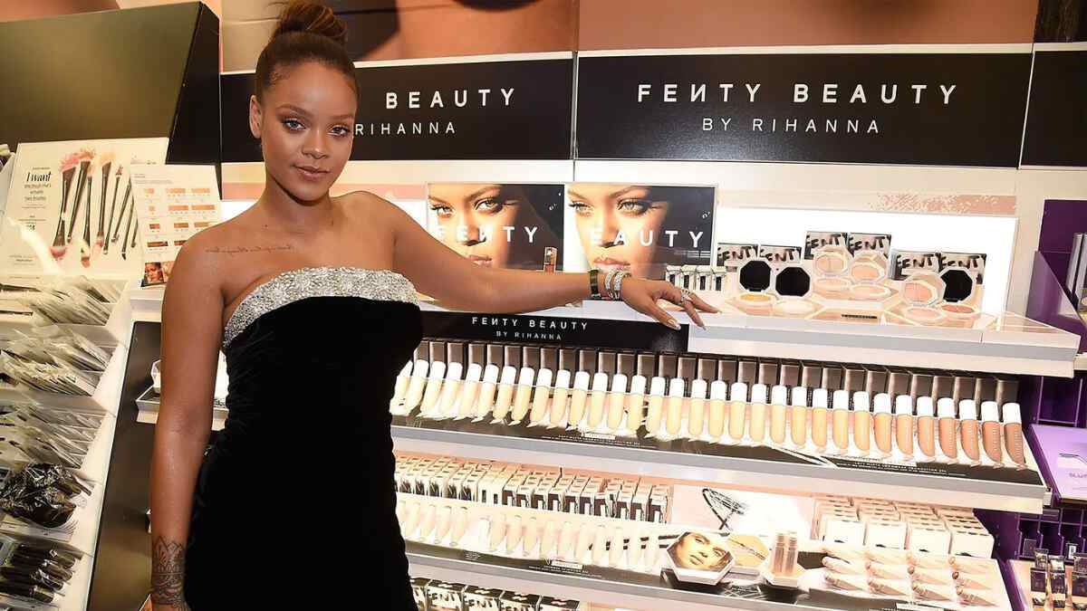 Rihanna at a Fenty Beauty event representing the brand’s multibillion-dollar valuation