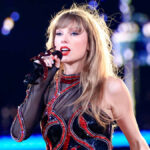Taylor Swift performing on stage during The Eras Tour