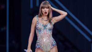 Taylor Swift a Billionaire – pop star on stage during The Eras Tour, symbolizing her record-breaking wealth and music empire