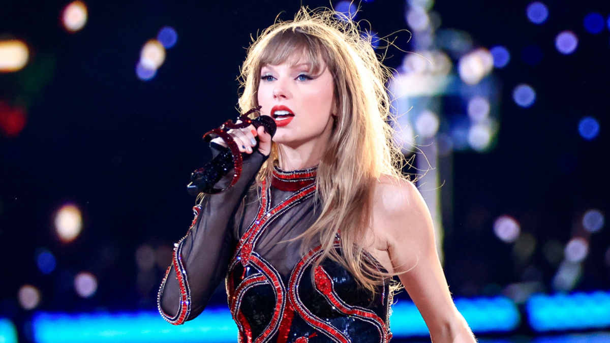 Taylor Swift performing on stage during The Eras Tour